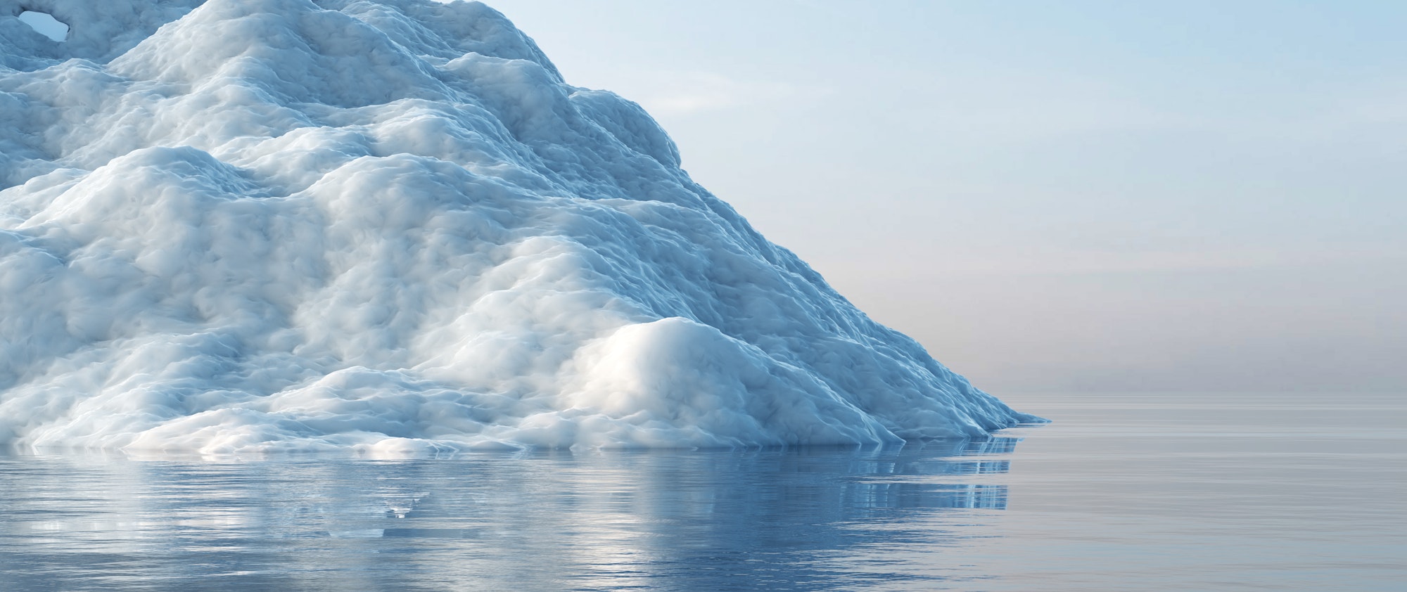 Melting iceberg on the ocean. Global warming and climate change