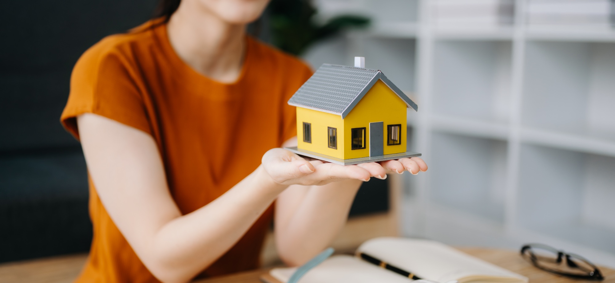 Considering buying a home, investing in real estate. Broker signs a sales agreement. agent, lease
