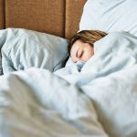 Woman sleeping in bed