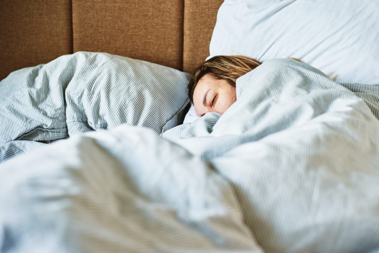Woman sleeping in bed