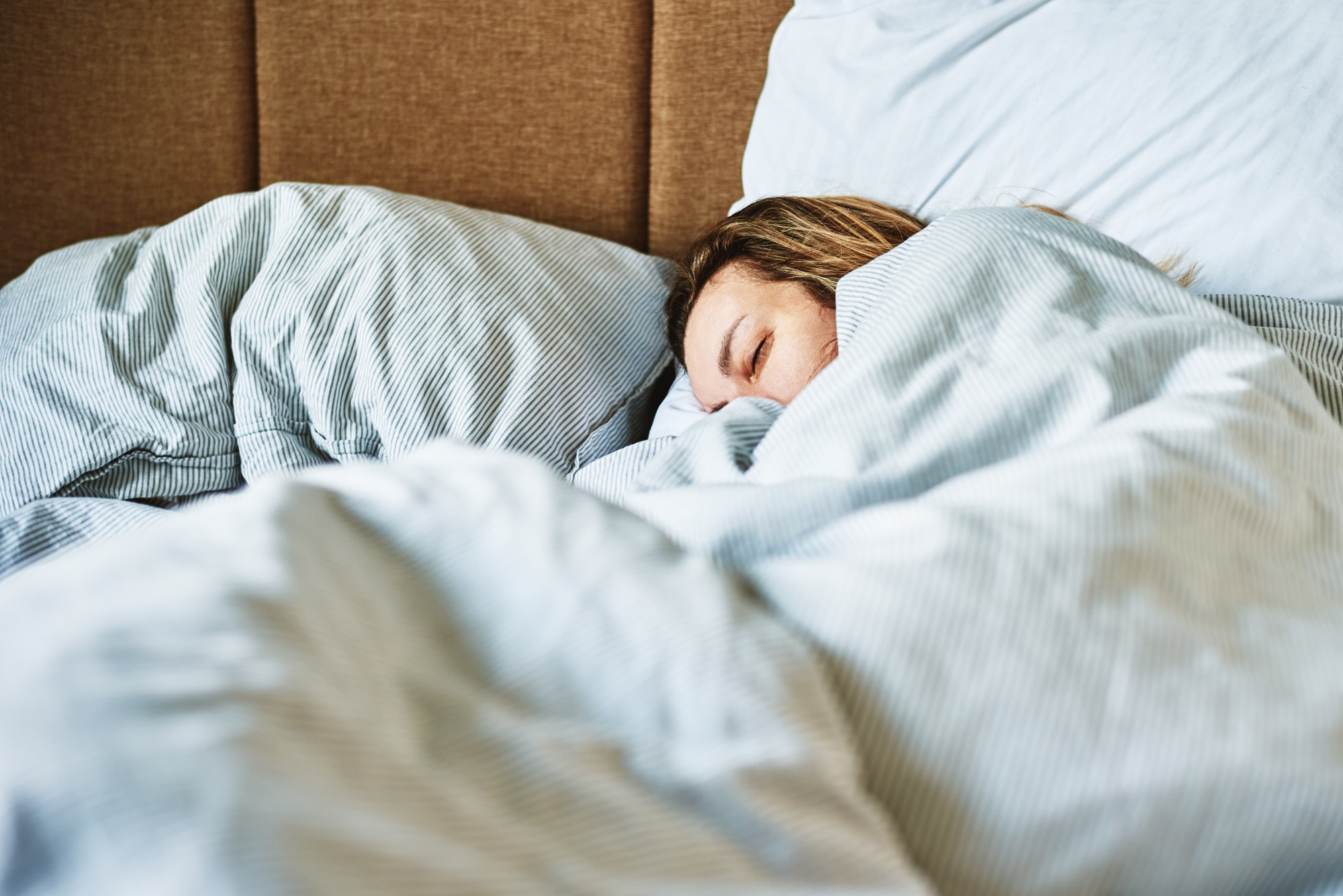 Woman sleeping in bed